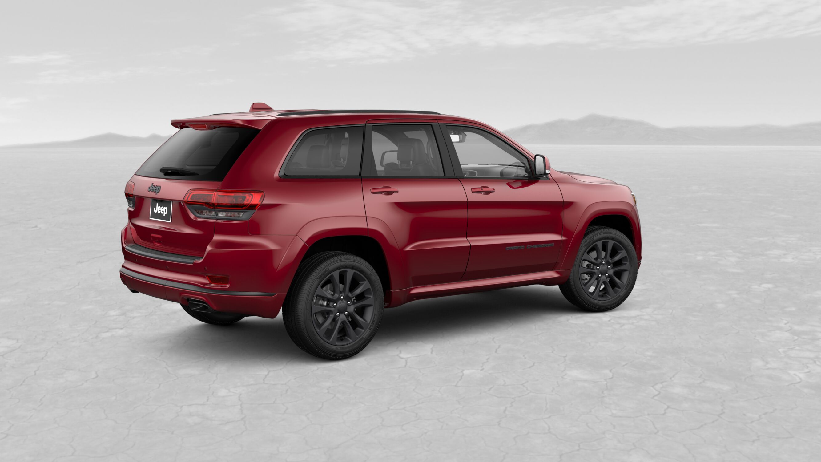 2018 Jeep Grand Cherokee High Altitude Velvet Red Exterior Rear and Side View
